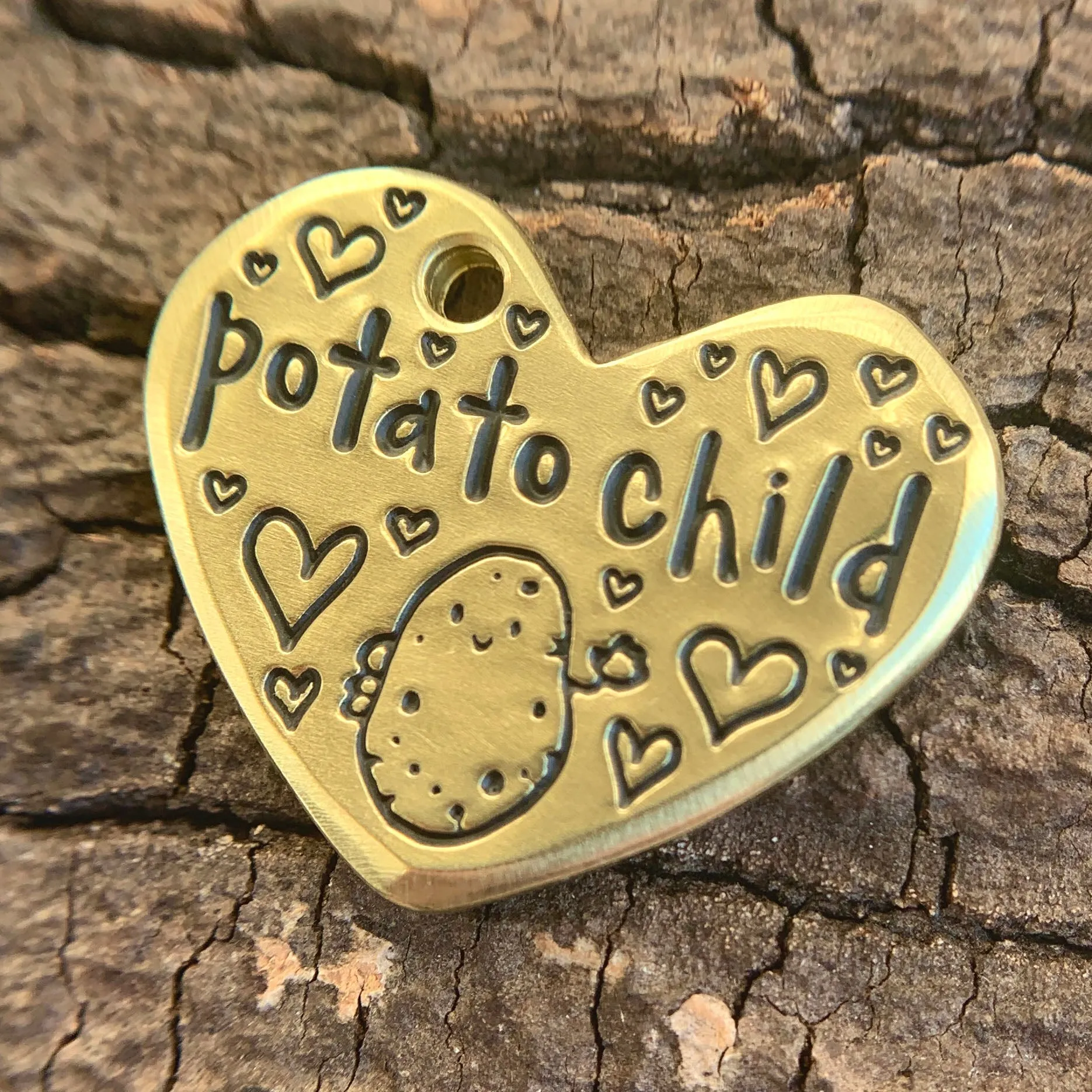 1.25" brass - potato child