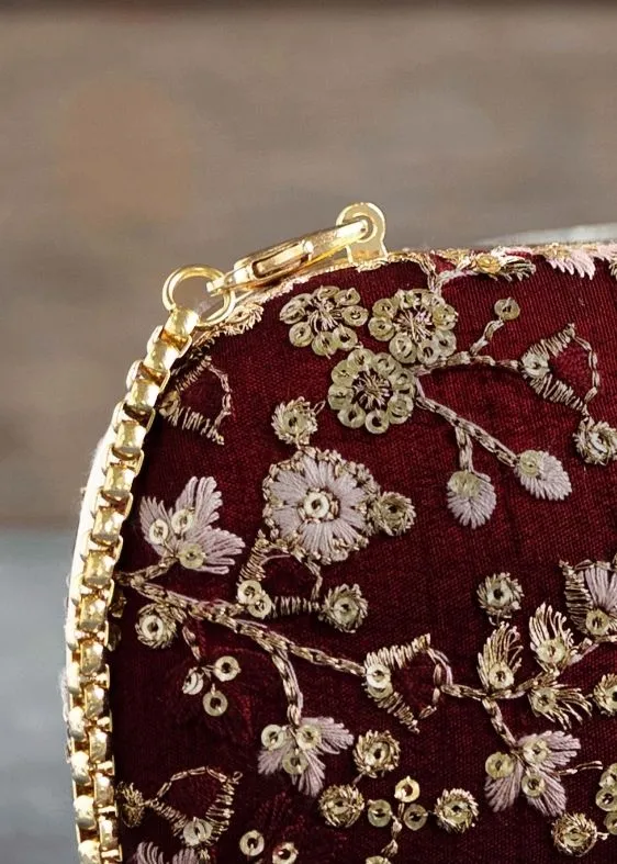 Elan maroon silk capsule clutch