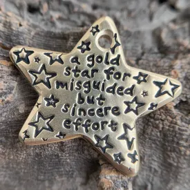 medium brass star - misguided but sincere